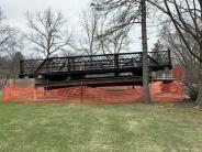 Robert Parker Coffin Bridge removed from construction  site and sitting in alternate site. 